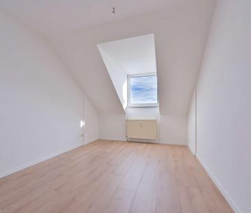 Großzügige 2‑Raum-Wohnung: Wohnzimmer und eigene Dachterrasse in ru... - Foto 5