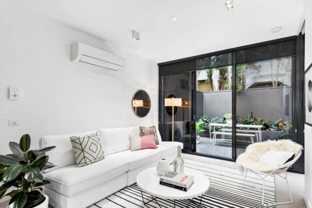 A Rare Ground Floor Oasis in the Monarc - Photo 1