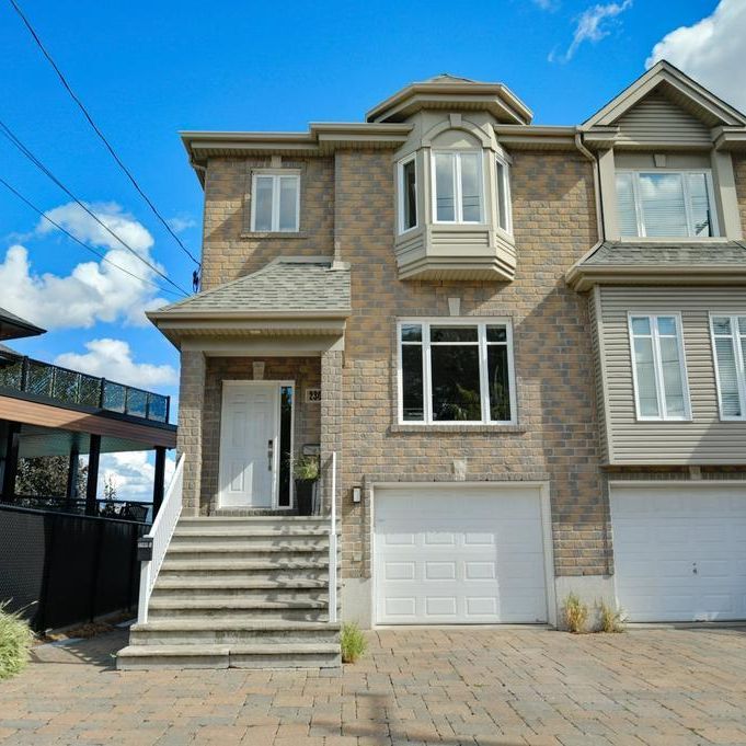 Maison en rangé à louer aux abords de la rivière des Prairies à Laval - Photo 1