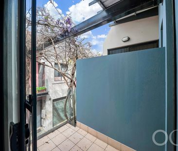 Open the Door to Inner-City Comfort and Contemporary Living - Photo 5