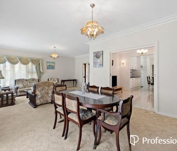 Spacious 4-Bedroom Family home in Prime McKinnon Zone - Photo 1