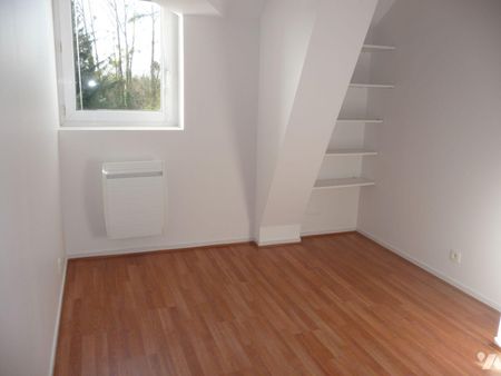 IRODOUER, rue de Dinan, appartement type 3 duplex, 63m², rez-de-chaussée, comprenant: - au re... - Photo 2