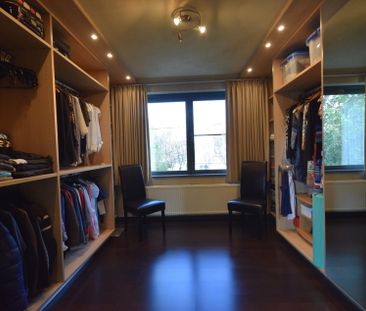 WONING MET ZONNIGE STADSTUIN - Photo 6