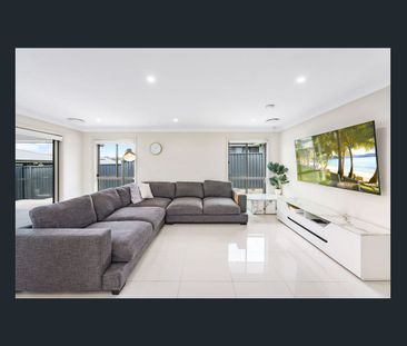 Modern Family Home with Space and Convenience - Photo 1