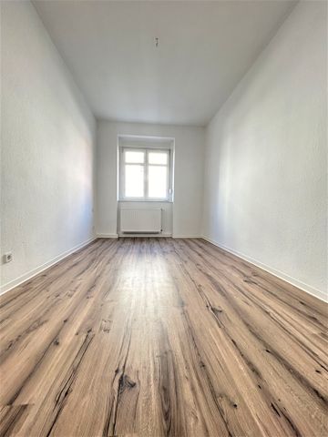 Großzügig geschnittene 2-Zimmer-Wohnung im Erdgeschoss - Foto 2