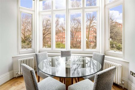 A bright and generously proportioned two bedroom first floor apartment with wooden flooring and lift access. - Photo 3