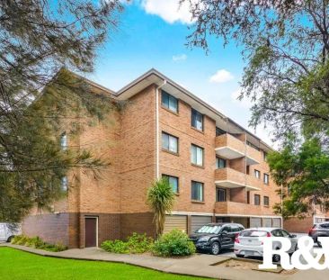 “Perfectly Located Two Bedroom Unit” - Photo 3