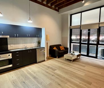 CITY LIVING AT IT'S BEST - PARTIALLY FURNISHED - Photo 3