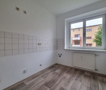 Gepflegte 2-Raum-Wohnung in ruhiger Lage - Foto 6