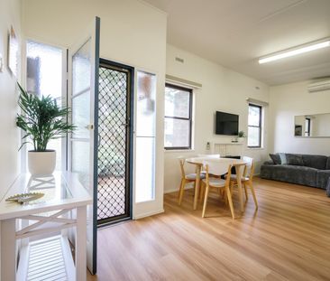 Coastal retreat steps from the shore! - Photo 1