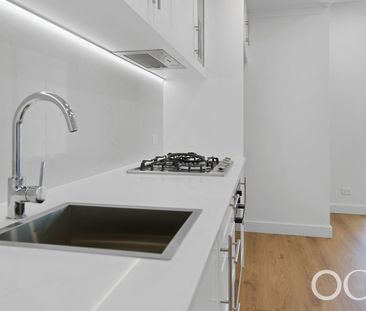 Open the Door to Elevated East-Facing Living with Sweeping Views - Photo 6