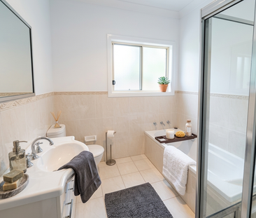 Spacious 3-Bedroom Modern, Quiet & Low-Maintenance Home | Walk to V... - Photo 5