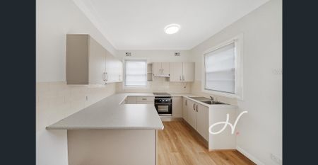 FRESHLY UPDATED HOME IN A CONVENIENT LOCATION - Photo 4