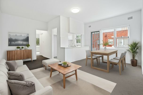TOP FLOOR FULLY RENOVATED TWO BEDROOM APARTMENT - Photo 1