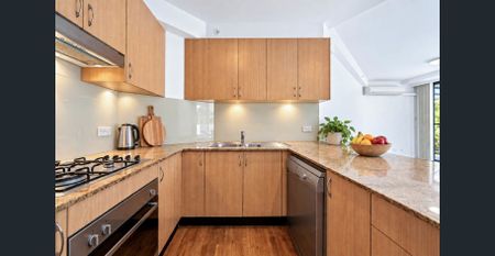 STYLISH APARTMENT WITH HUGE ENTERTAINING TERRACE! - Photo 3