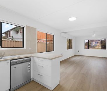 FRESHLY UPDATED TWO-BEDROOM HOME CLOSE TO THE WATER - Photo 5