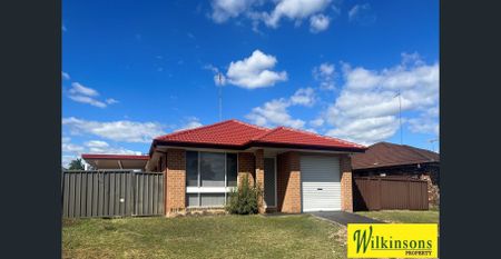 Better than New - 3 bedroom home on large block with garage - Photo 4