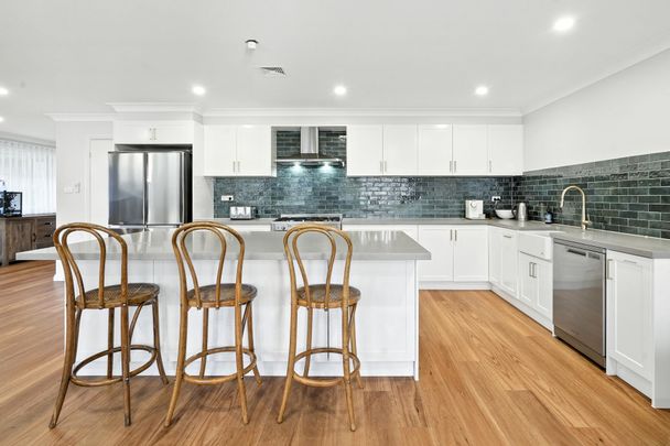 Spacious Family Home in a Peaceful Glenmore Park Location - Photo 1