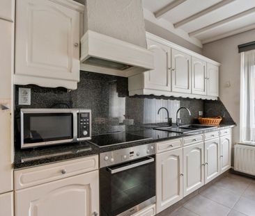 Ruime eengezinswoning met authentieke charme in Koninksem - Photo 6