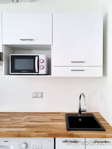 Logement à Paris, Location meublée - Photo 2