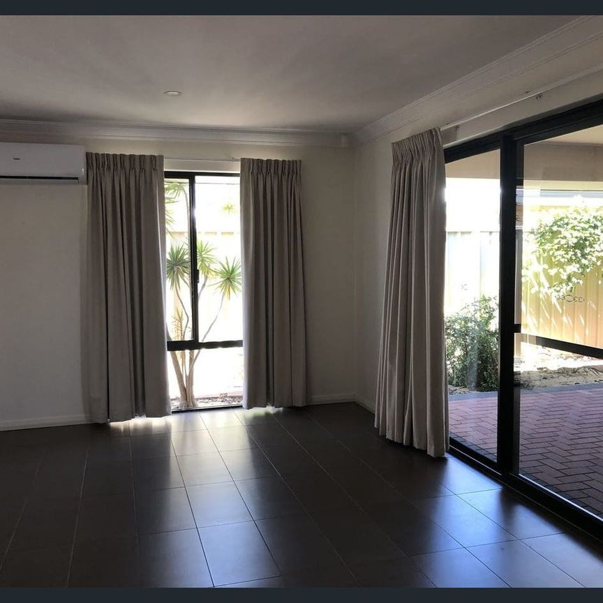 Enjoy Stylish Living and Spacious Comfort in this Low-Maintenance, Air-Conditioned Gem! - Photo 1