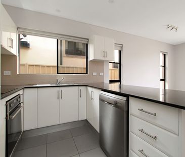 Four-Bedroom Duplex Close to Beach - Photo 5