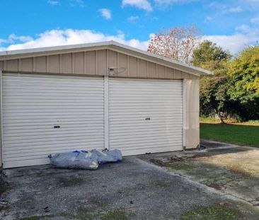 Spacious 4-Bedroom Home in Prime Location - Photo 1