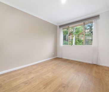 Discover Serenity in This Renovated 2-Bedroom Apartment with Green ... - Photo 1