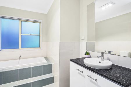 Spacious Family Home with Multiple Living Areas & Outdoor Entertaining - Photo 4