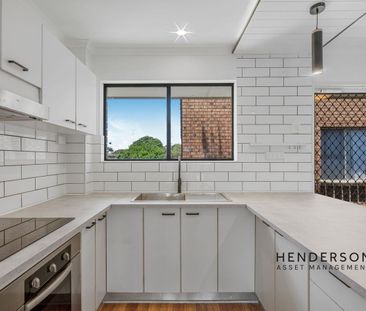 BRIGHT & BREEZY WATERFRONT LIVING WITH STUNNING VIEWS - Photo 5