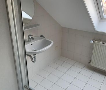Gemütliche Dachgeschosswohnung in ruhiger Wohnlage - Photo 1