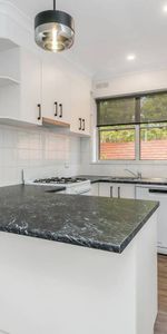 Renovated with plenty of modern conveniences - Photo 3