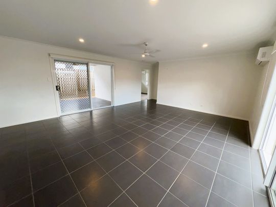 BREAK LEASE - Modern 4-Bedroom Home in Sought-After Gainsborough Greens Estate - Photo 1