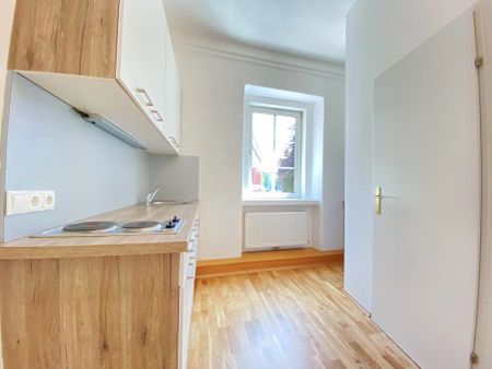 Ruhig und nur zwei Minuten entfernt von der quirligen City - Photo 2