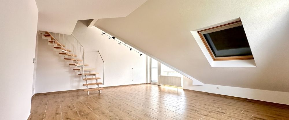 Ansprechende Maisonette-Wohnung mit Einbauküche und Loggia in zentraler Wohnlage - Foto 1