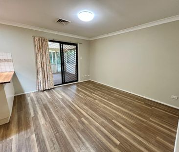 Refreshed Three-bedroom home - Photo 3