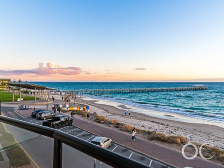 Open the Door to Beachside Elegance with Sweeping Views - Photo 2