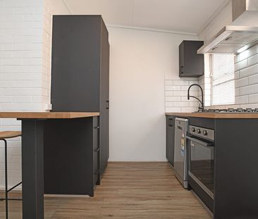 MODERN FURNISHED APARTMENT IN GREAT LOCATION - Photo 6