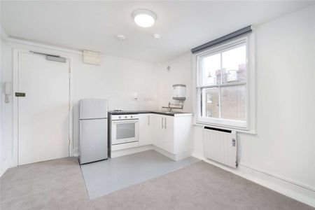 A fourth floor studio apartment situated on Cranley Place, a quiet residential street in South Kensington - Photo 3