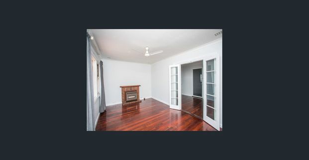 Neat family home with large yard & close proximity to schools. - Photo 1