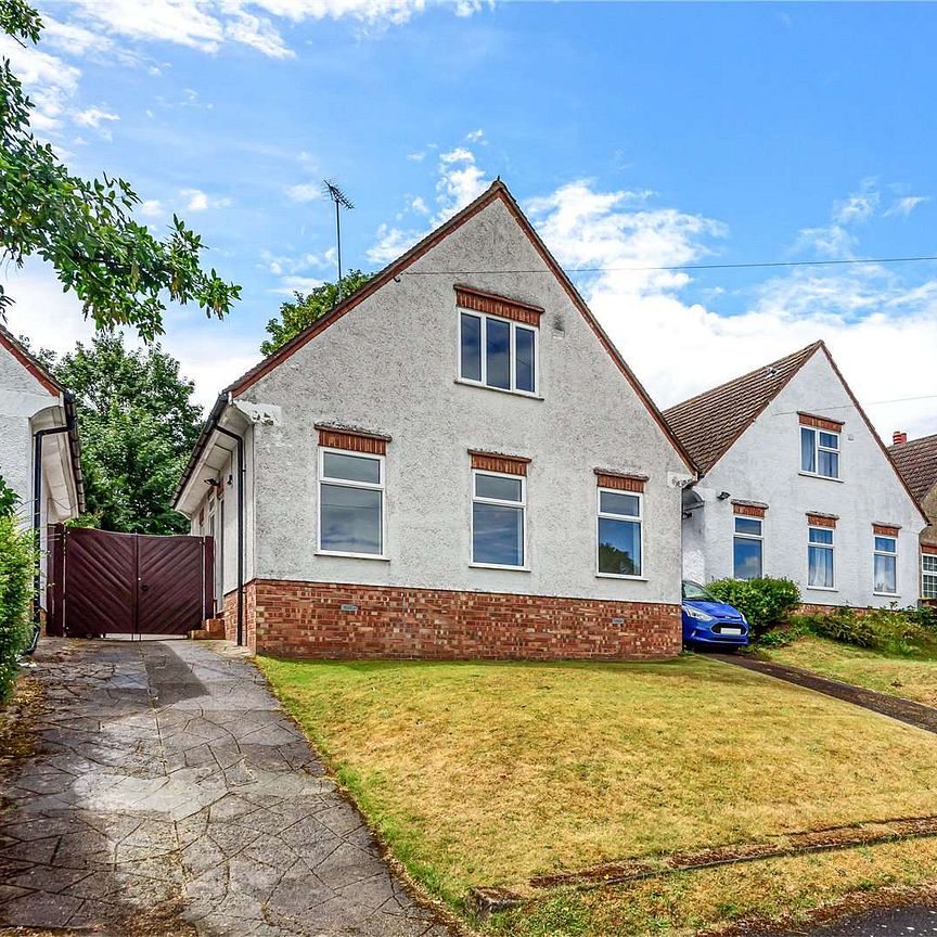 A three bedroom detached family home to rent, situated in a quiet cul de sac, within 1 mile of Reading's town centre. - Photo 1