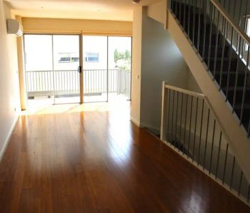 “Bright, Fresh, Stunning Townhouse with Open Plan living!” - Photo 3