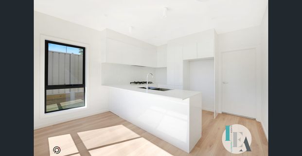 Modern Living at Its Finest – Brand-New, Stylish Townhouse - Photo 1