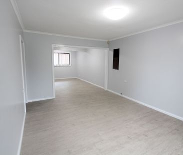 Immaculate Home Includes Security Alarm & A/C - Walking Distance to... - Photo 2