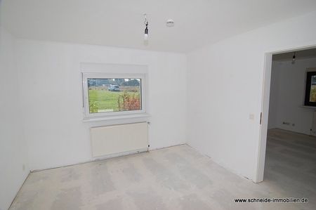 Freundliche 2-2/2-Zimmer-Erdgeschoss-Wohnung mit Terrasse im Gartenanteil - Foto 4