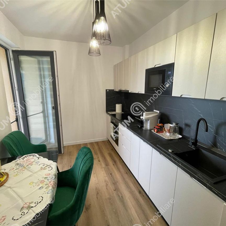 De inchiriat apartament modern cu 2 camere decomandate balcon si loc de parcare in zona Magnolia din Sibiu - Photo 1