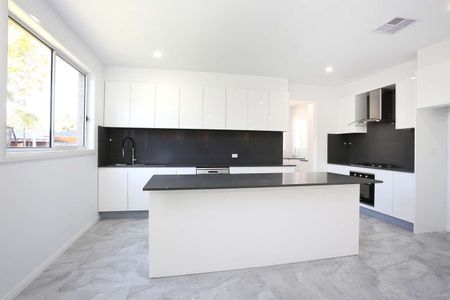 Modern and Spacious Family Home in Great Location - Photo 4