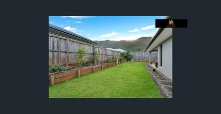 Modern 4-Bedroom Home with Media Room in Highly Sought-After Redlynch - Photo 4