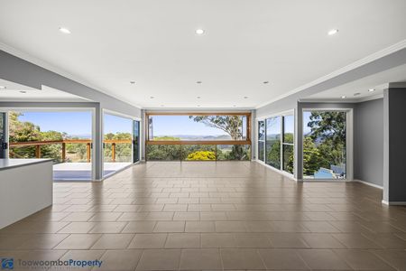 Elevate Your Lifestyle: Stunning Rangeville Home with Panoramic Views and Resort-Style Pool - Photo 5