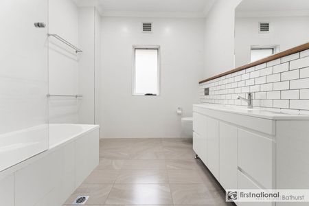 Stylish & Convenient Three Bedroom Home - Photo 3